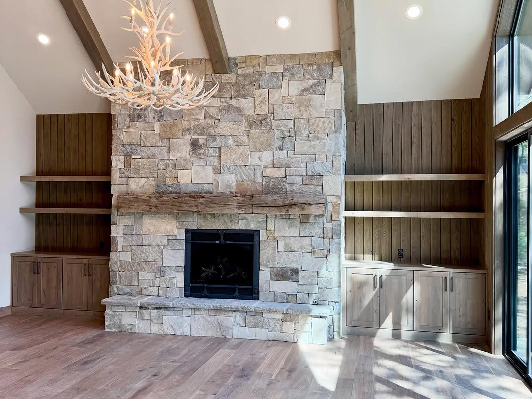 Great room with stone fireplace and alder built-ins