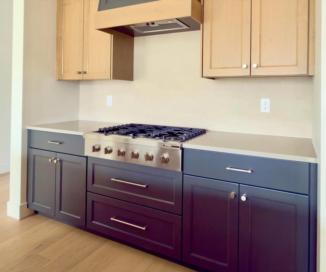 Navy kitchen with range, Eagle ID
